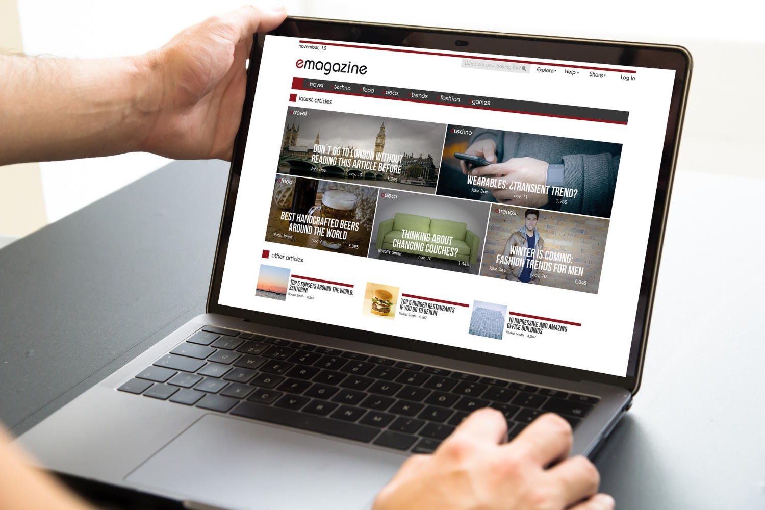 Person browsing emagazine website on laptop demonstrating Core Web Vitals optimization with fast-loading content tiles and responsive design.